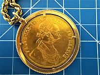 986 / 1000 Gold